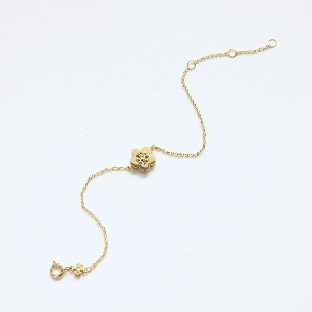 Tory Burch Gold Metal Flower Bracelet